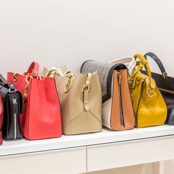 Collection,Of,Handbags,Standing,In,A,Row Collection,Of,Handbags,Standing,In,A,Row